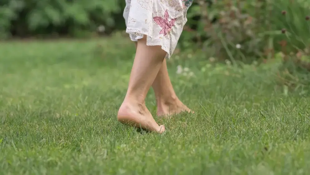 Walking barefoot on grass