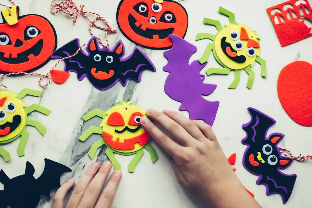 craft day with kids and friends to make spooky decorations and outfits.