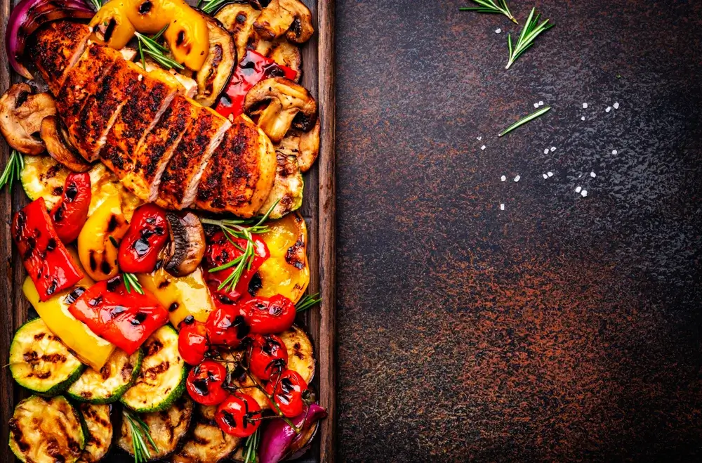 Baked chicken breast with roasted vegetables