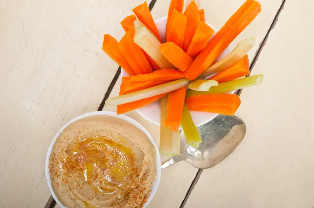 Carrot sticks with hummus.