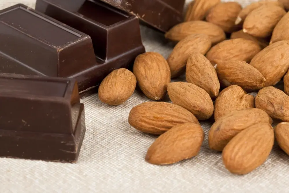 A handful of almonds and a piece of dark chocolate.