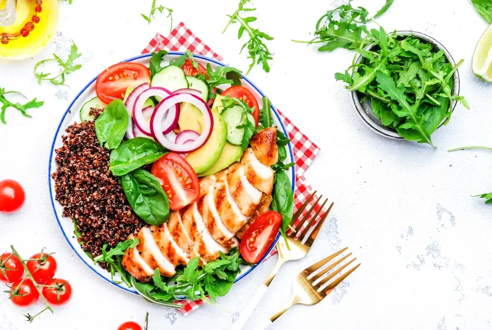 Chicken salad and quinoa and vegetables