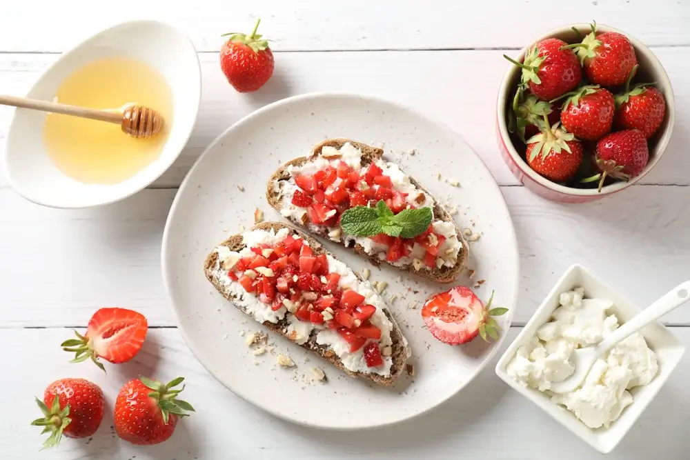 Ricotta toast with sliced strawberries