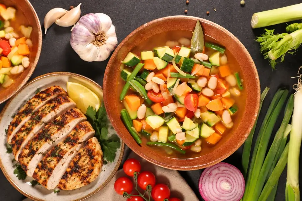 White bean and vegetable soup with a side of grilled chicken