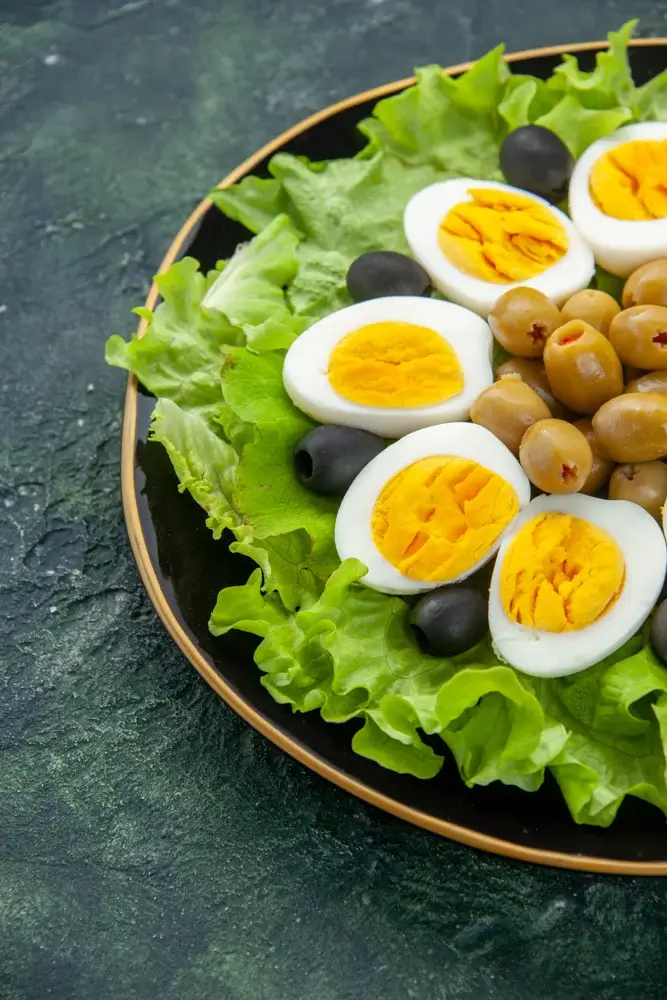 Hard-boiled eggs with some olives