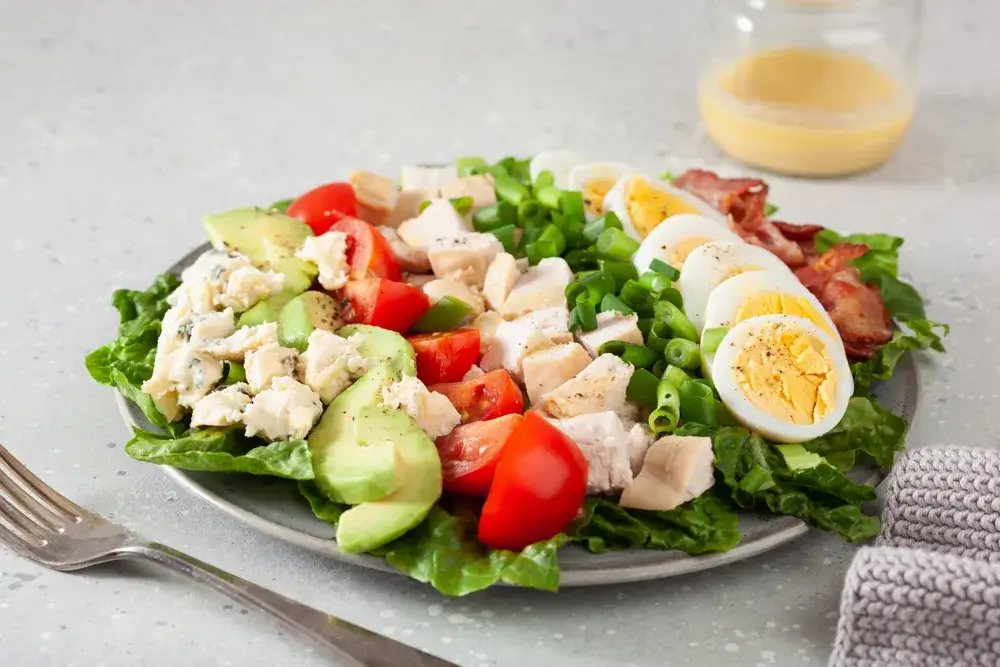 Grilled chicken Cobb salad with hard-boiled egg